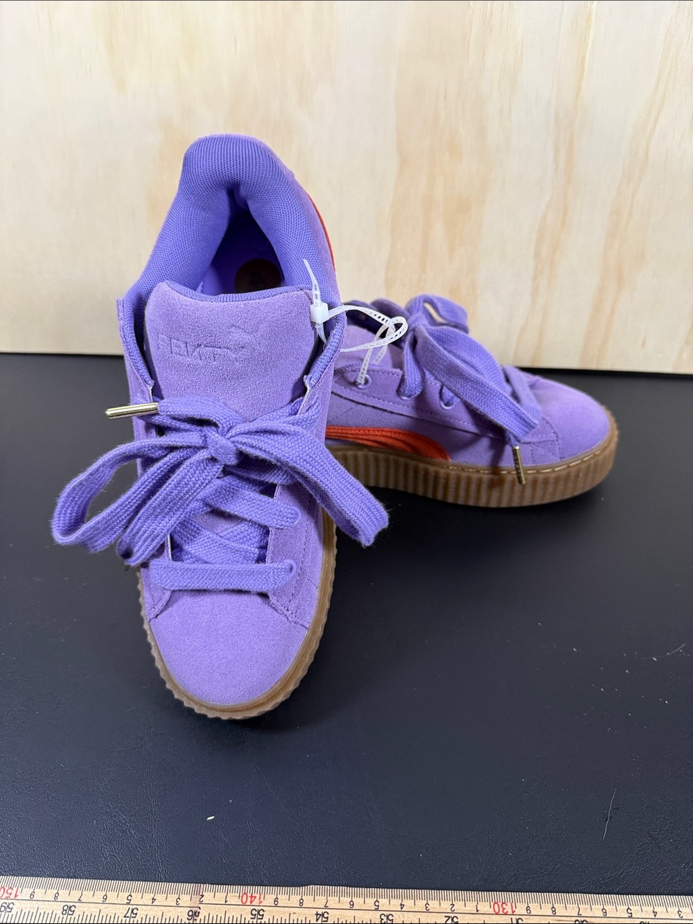 Puma Women’s Purple Suede Sneakers with Gum Sole and Orange Stripe